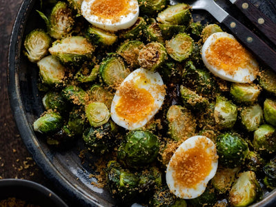 An unexpected list of side dish recipes to bring to Friendsgiving, ranging from roasted Brussels sprouts to jalapeno cheddar cornbread. | peteandgerrys.com