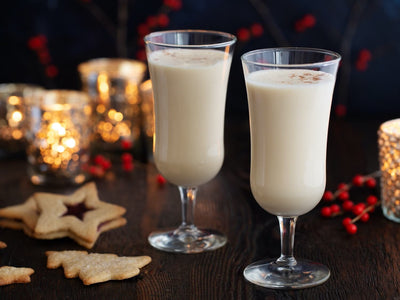 A creamy recipe for homemade eggnog that calls for separating egg whites from yolks and a splash of white rum, cognac, and bourbon. | peteandgerrys.com